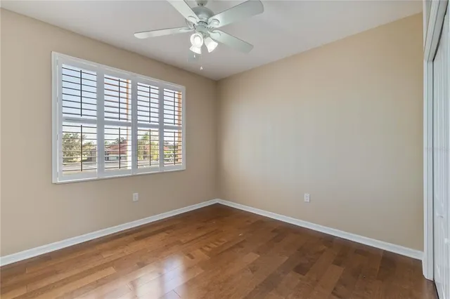 a view of front door with wooden floor
