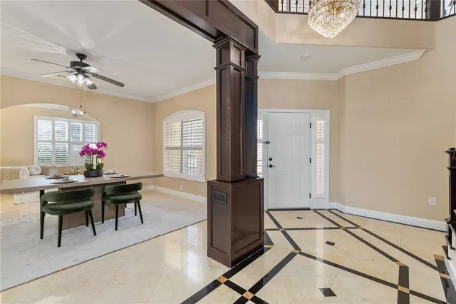 a kitchen with kitchen island granite countertop a sink cabinets stainless steel appliances and a counter top