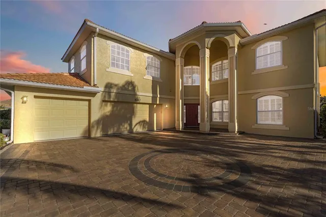 an aerial view of house with yard swimming pool and outdoor seating