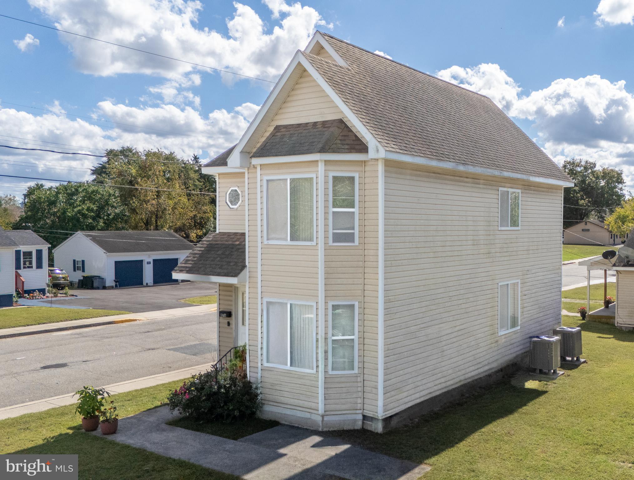 1176 West 6th Street Laurel, DE 19956 - Photo 3 of 42 a view of a house with a yard