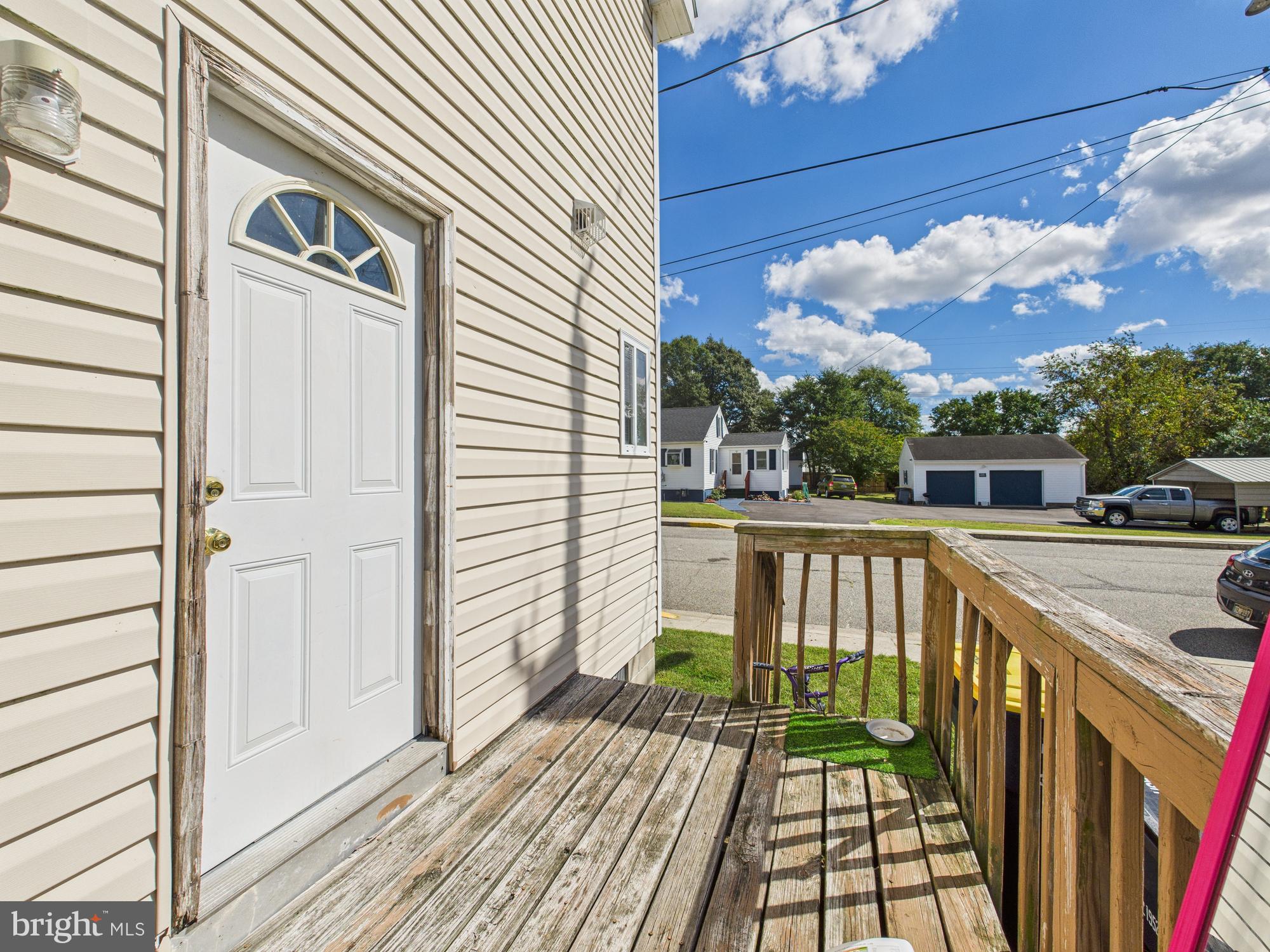1176 West 6th Street Laurel, DE 19956 - Photo 8 of 42 a view of a balcony with wooden floor