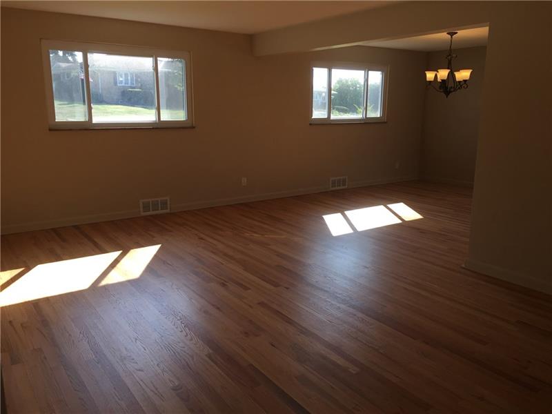70 Robinhood Road Pittsburgh, PA 15220 - Photo 8 of 25 Living Room with natural light and GORGEOUS hard wood floors!!!