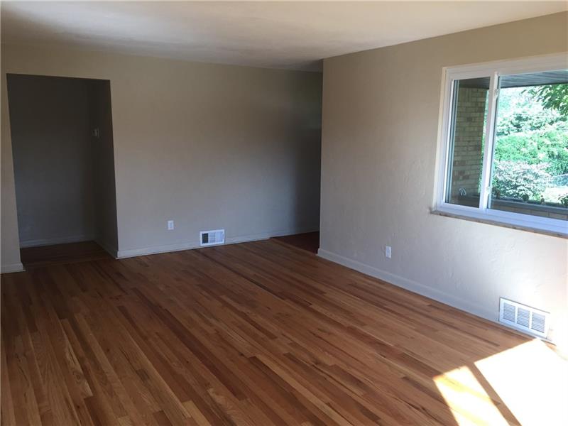 70 Robinhood Road Pittsburgh, PA 15220 - Photo 9 of 25 Living Room view back toward entry door
