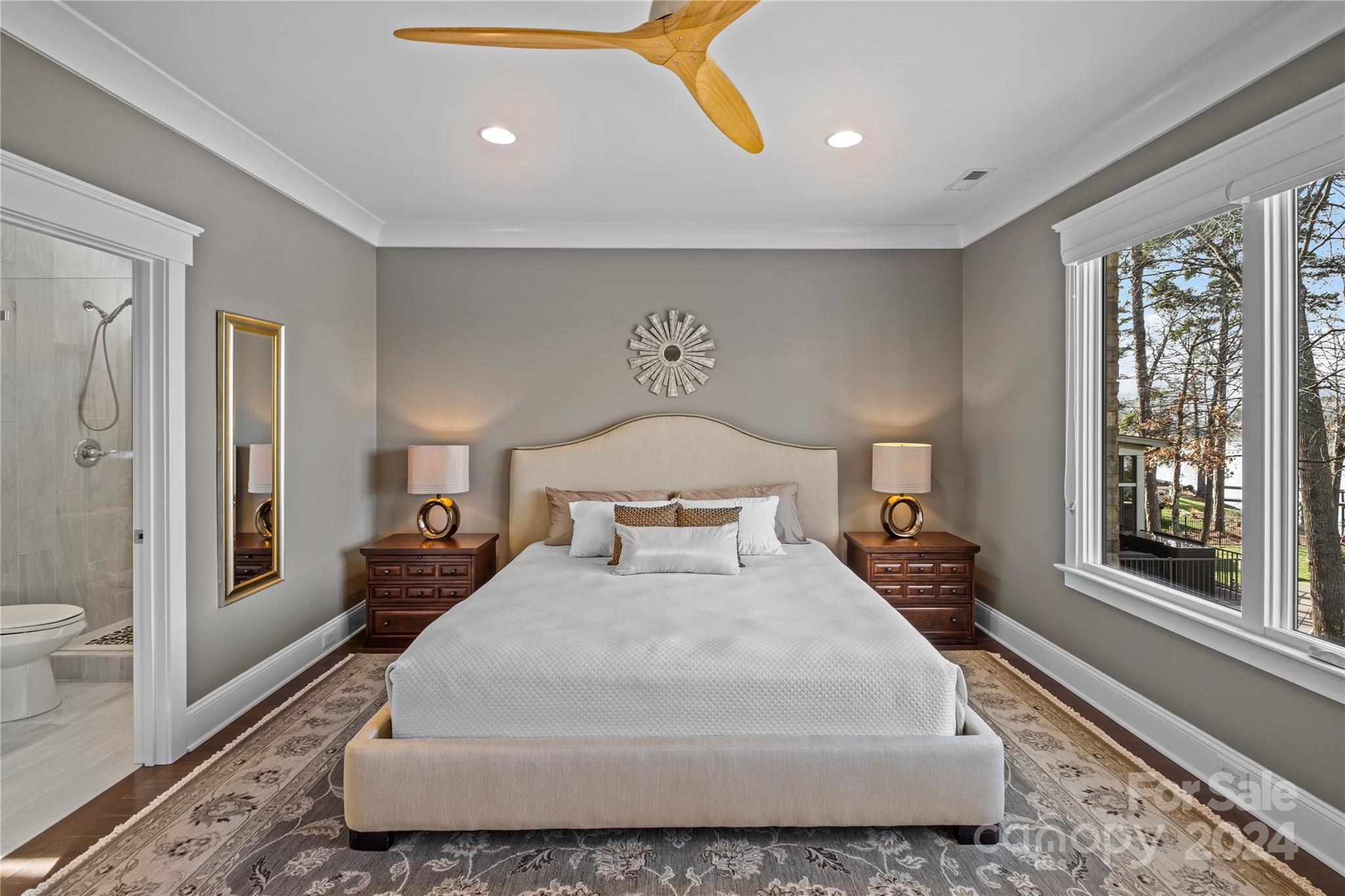 1540 Reflection Pointe Boulevard Belmont, NC 28012 - Photo 28 of 47 a large white bed sitting in a room next to a window