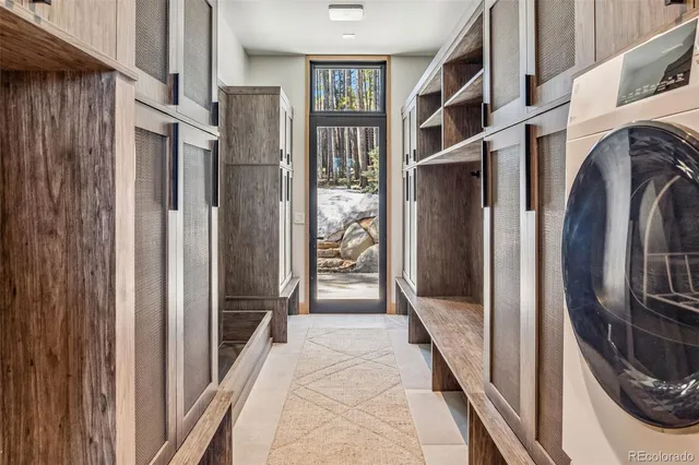 a view of hallway with washer and dryer