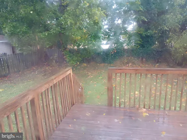 a view of backyard with green space