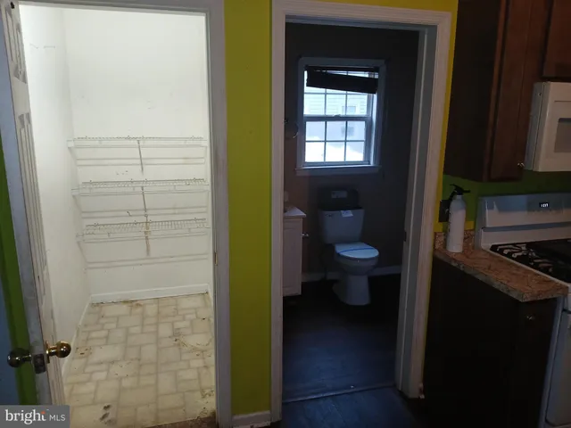 a view of a bathroom with a toilet