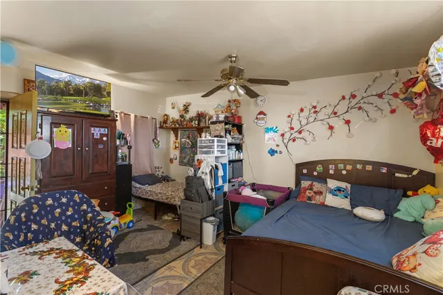 a bedroom with furniture and a couch