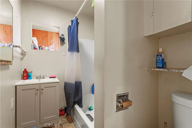 a view of a house with a sink and chair