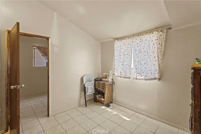 a view of an empty room with window