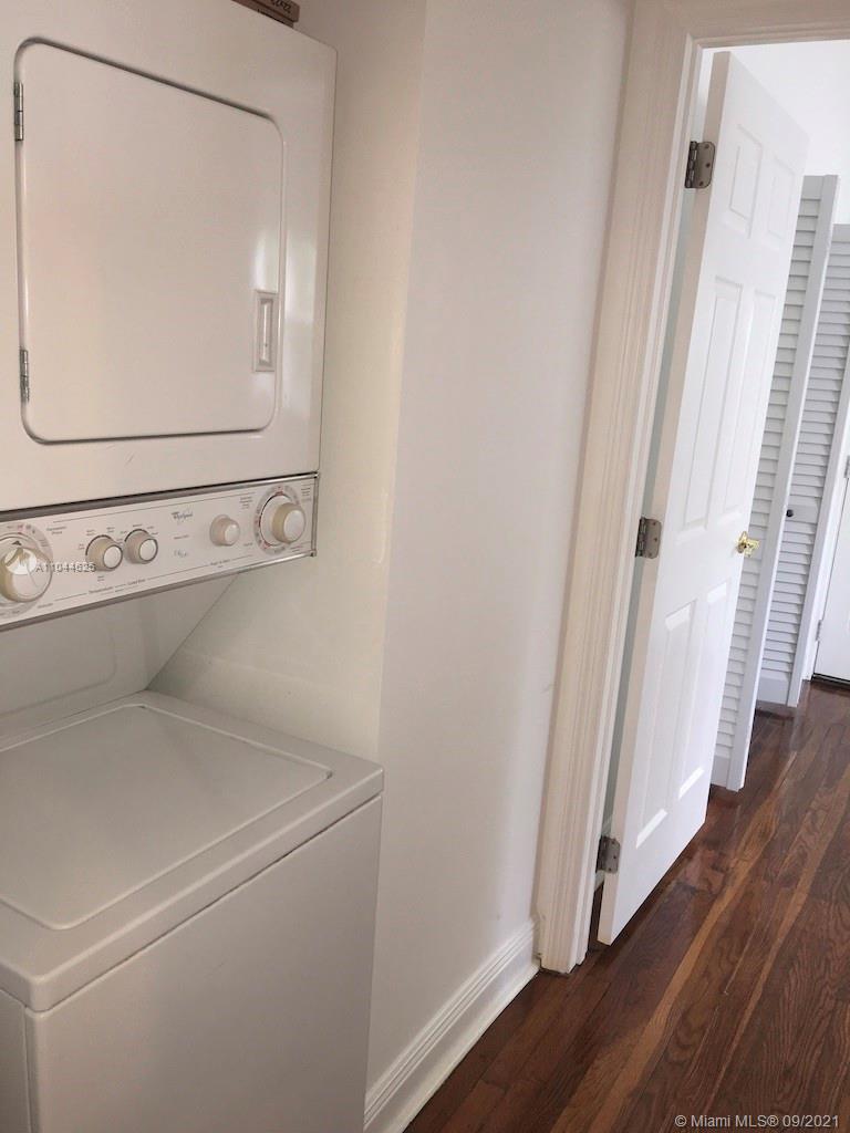 410 Southwest 22nd Road Miami, FL 33129 - Photo 18 of 37 a view of a storage and utility room with a washer dryer