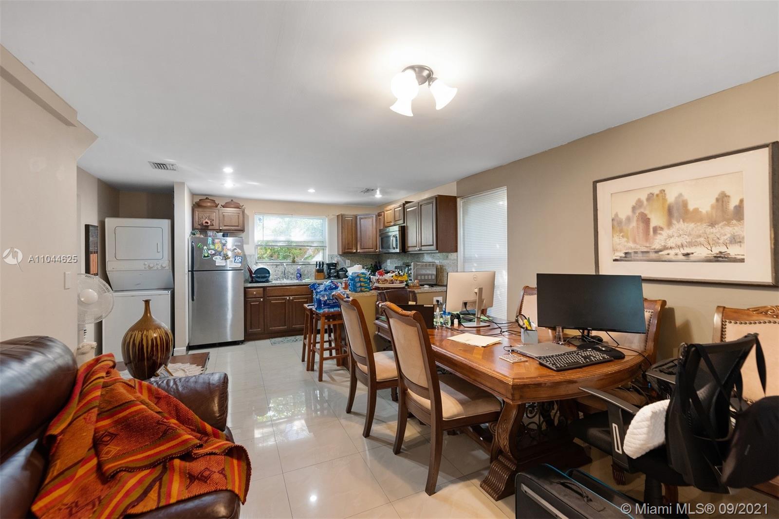 410 Southwest 22nd Road Miami, FL 33129 - Photo 24 of 37 a view of a dining room with furniture