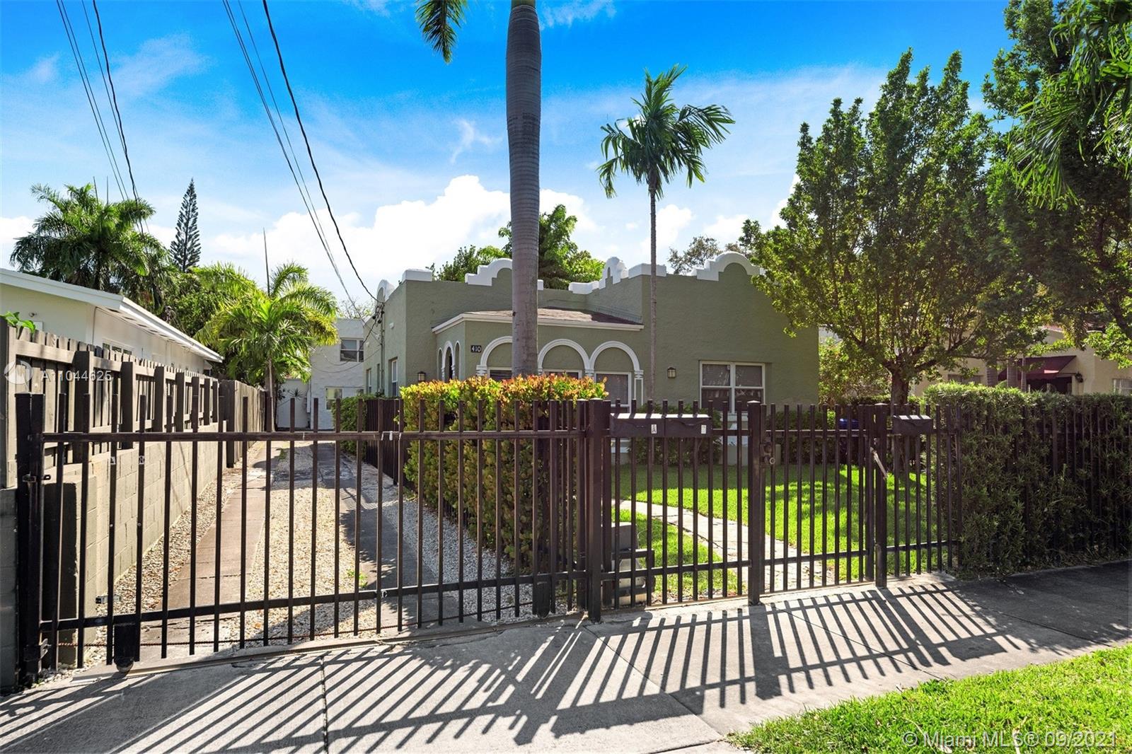 410 Southwest 22nd Road Miami, FL 33129 - Photo 5 of 37 a view of a wrought iron fences in front of house