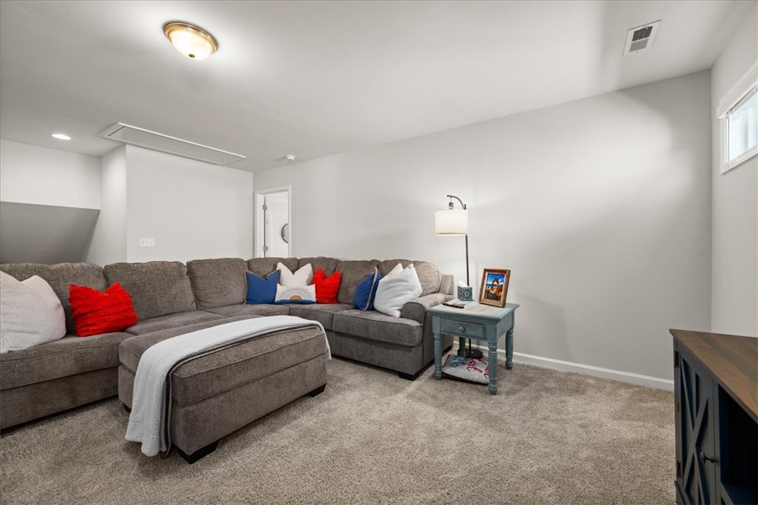 216 Carvel Trail Seneca, SC 29678 - Photo 23 of 46 This inviting family room offers a perfect blend of comfort and style for relaxation and gatherings.