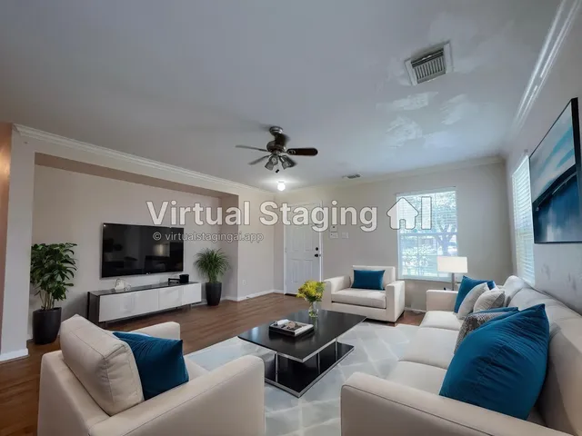 a living room with furniture a flat screen tv and a large window