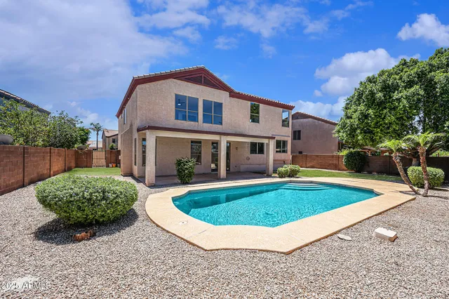 a view of outdoor space yard and swimming pool