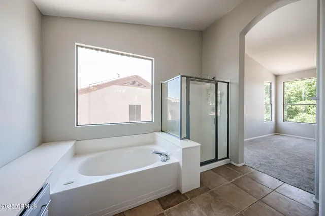 a view of a house with a yard porch and sitting area