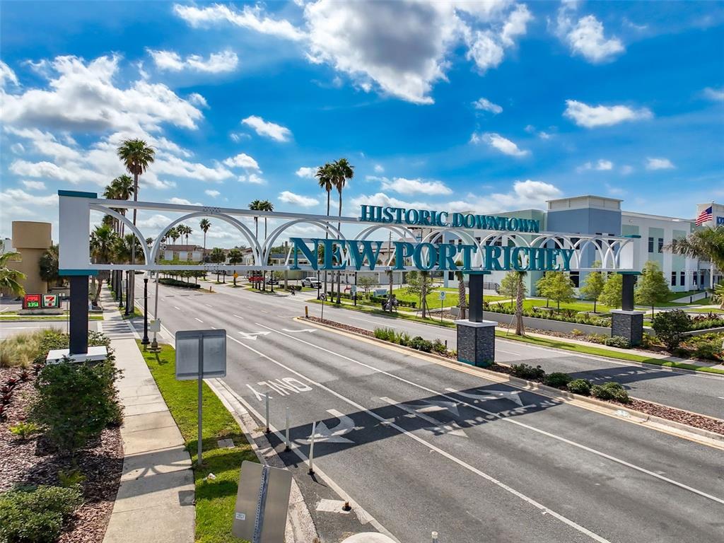 5800 Madison Street New Port Richey, FL 34653 - Photo 37 of 71 a view of a swimming pool with an outdoor seating