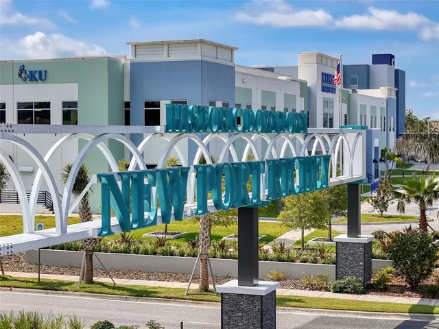 a view of a lake with a yard from a lake view