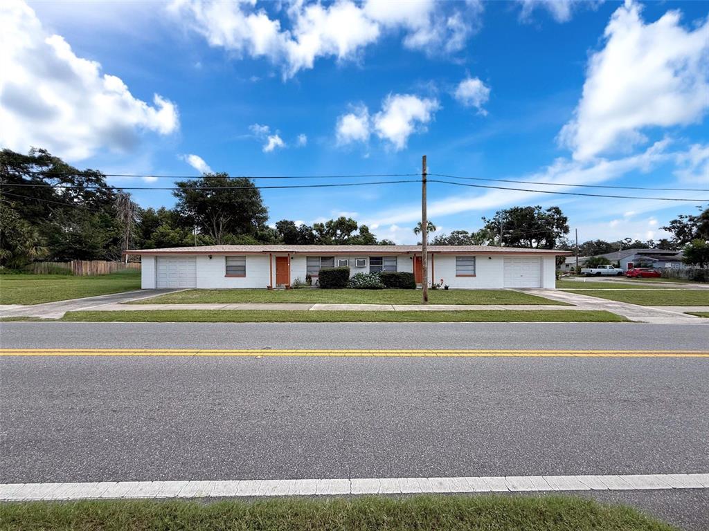 5800 Madison Street New Port Richey, FL 34653 - Photo 5 of 71 a view of a swimming pool with an outdoor seating