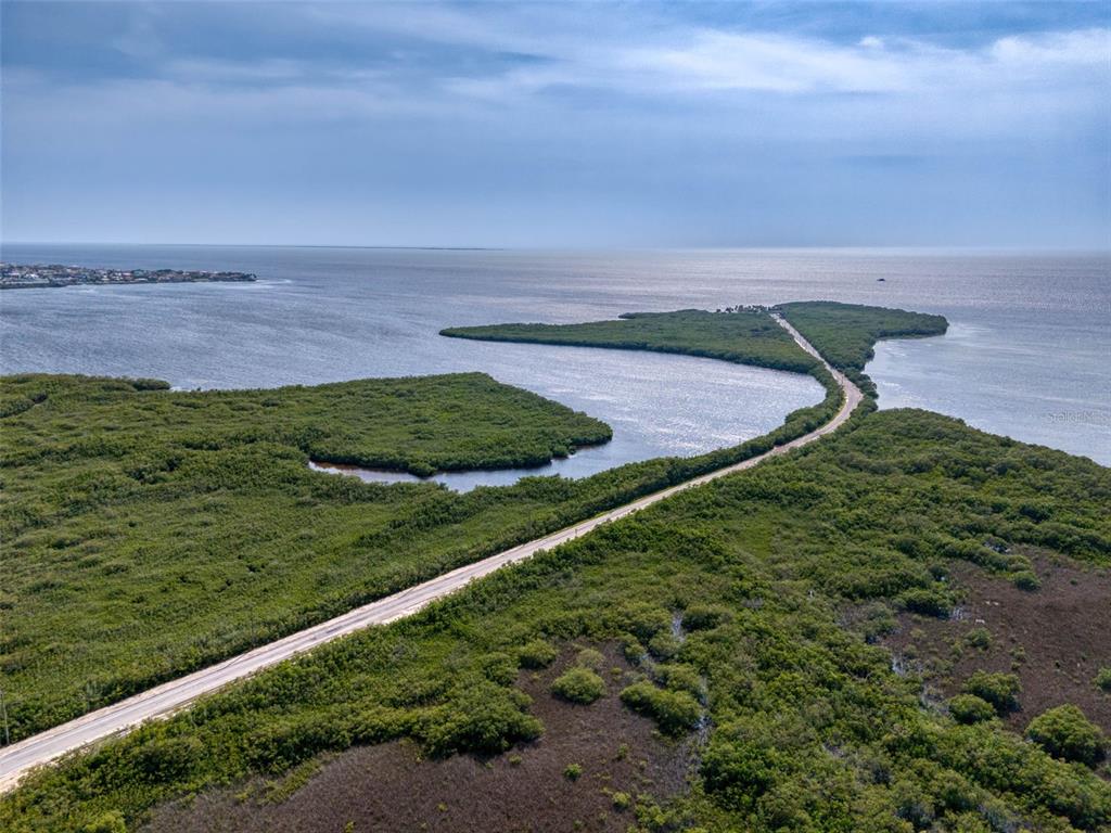 5800 Madison Street New Port Richey, FL 34653 - Photo 59 of 71 a view of a field with an ocean