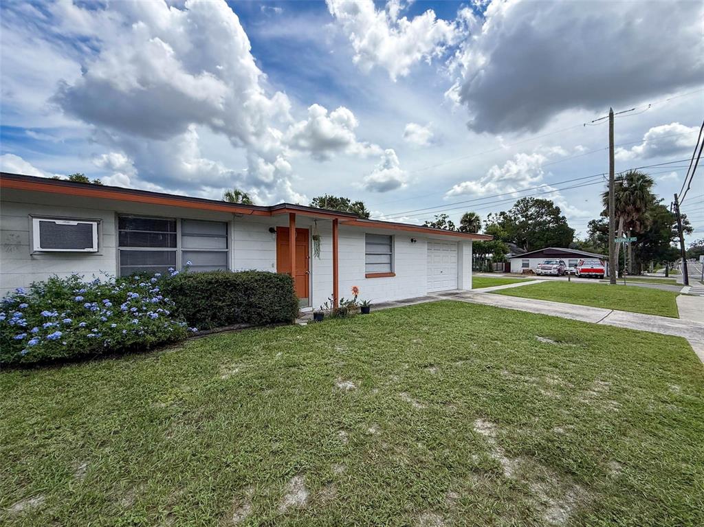 5800 Madison Street New Port Richey, FL 34653 - Photo 7 of 71 a view of a house with backyard and garden