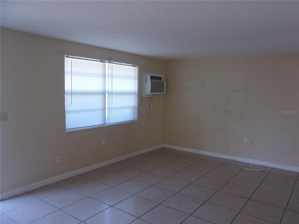 5800 Madison Street New Port Richey, FL 34653 - Photo 73 of 82 an empty room with a window