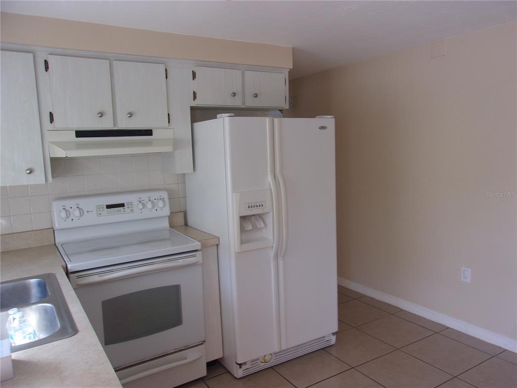 5800 Madison Street New Port Richey, FL 34653 - Photo 80 of 82 a view of a kitchen with washer and dryer