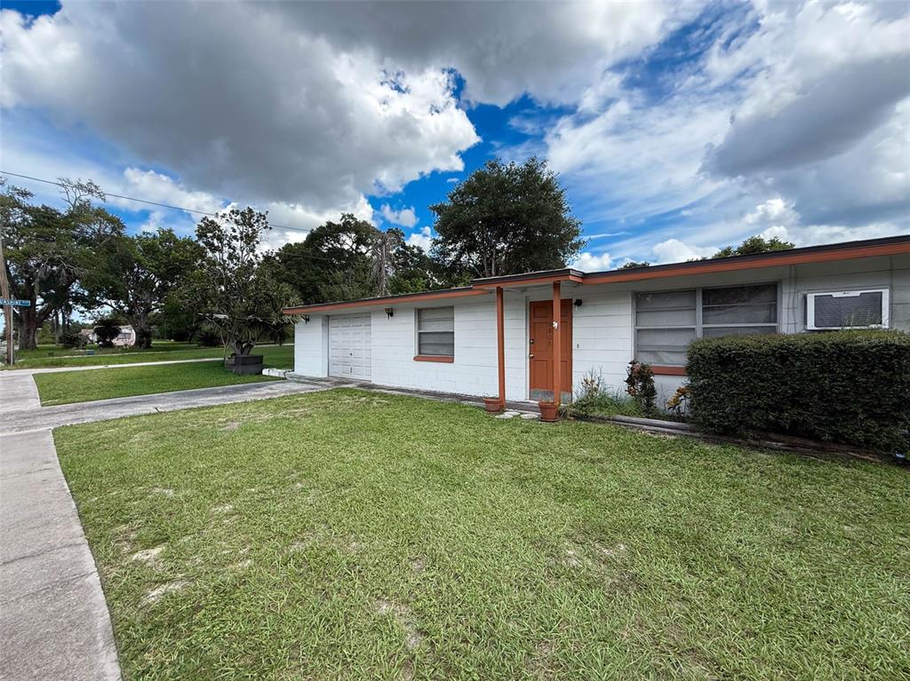 5800 Madison Street New Port Richey, FL 34653 - Photo 8 of 71 a view of a house with backyard and garden