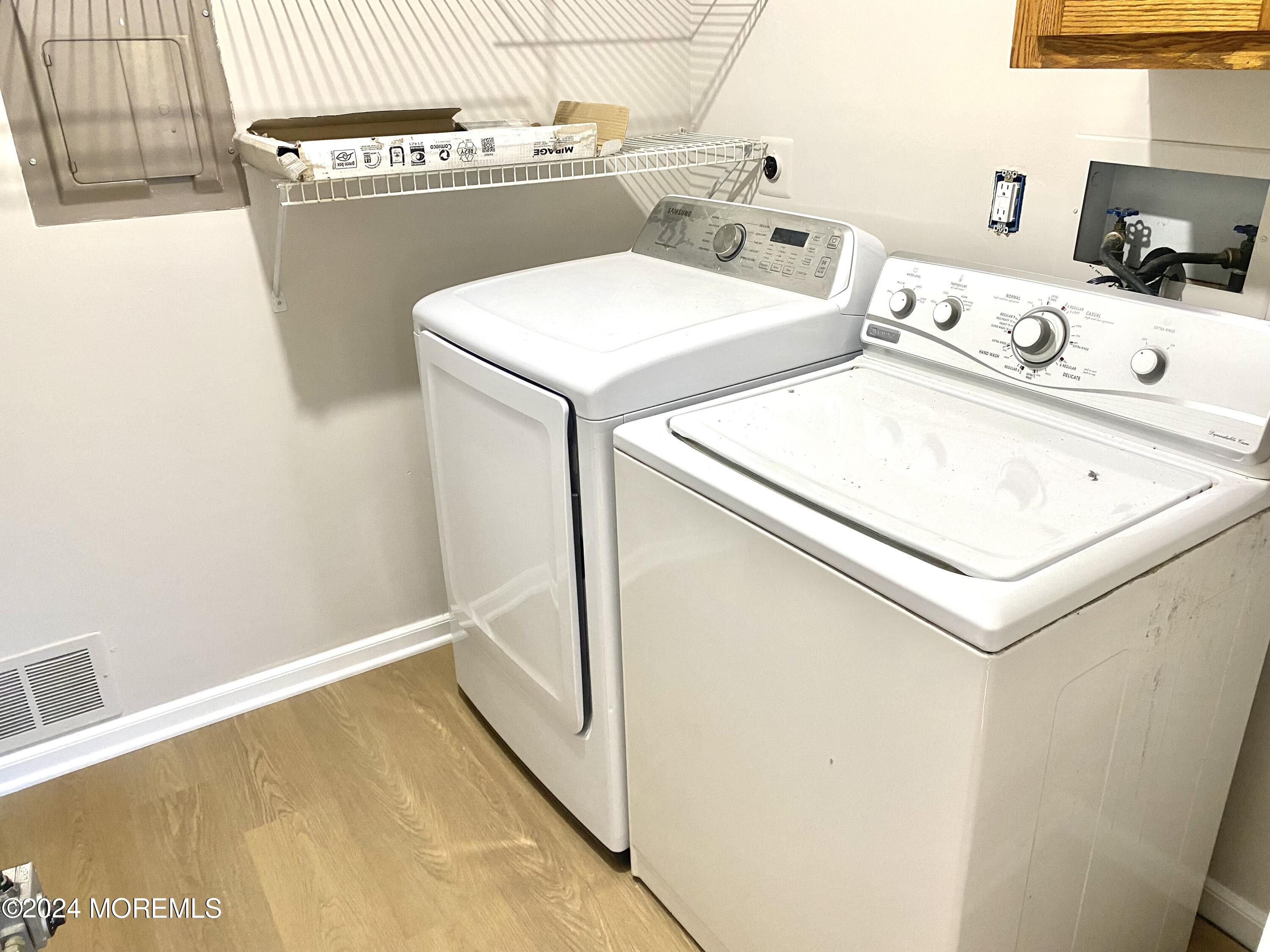 108 Chatham Lane, Unit B Point Pleasant, NJ 08742 - Photo 11 of 14 a utility room with dryer and washer