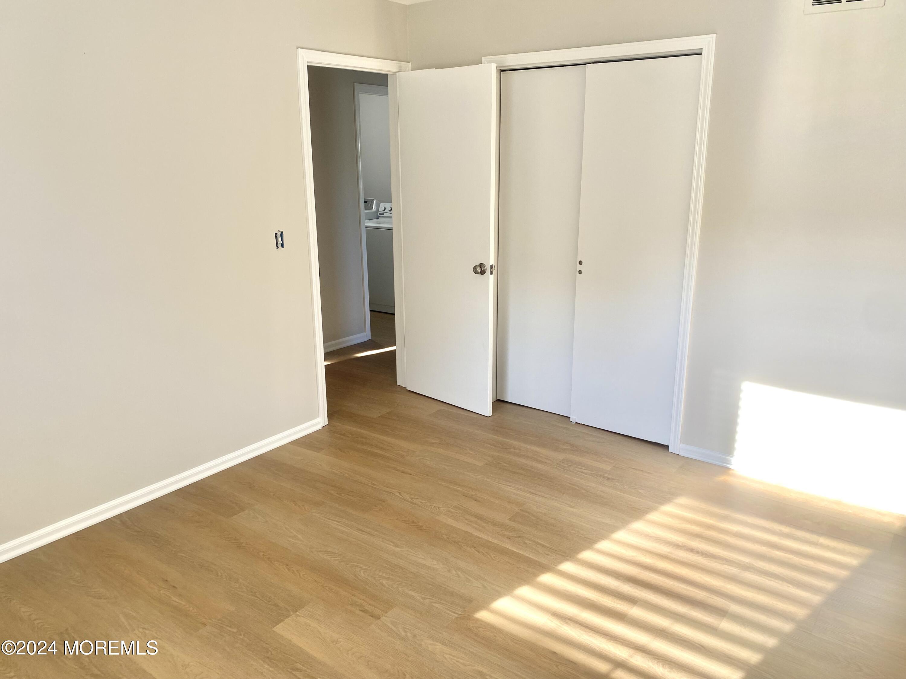 108 Chatham Lane, Unit B Point Pleasant, NJ 08742 - Photo 6 of 14 a view of an empty room