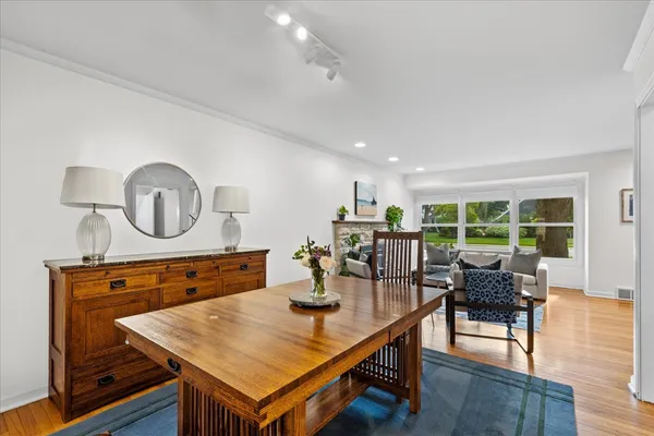 a view of a dining room with furniture window and outside view