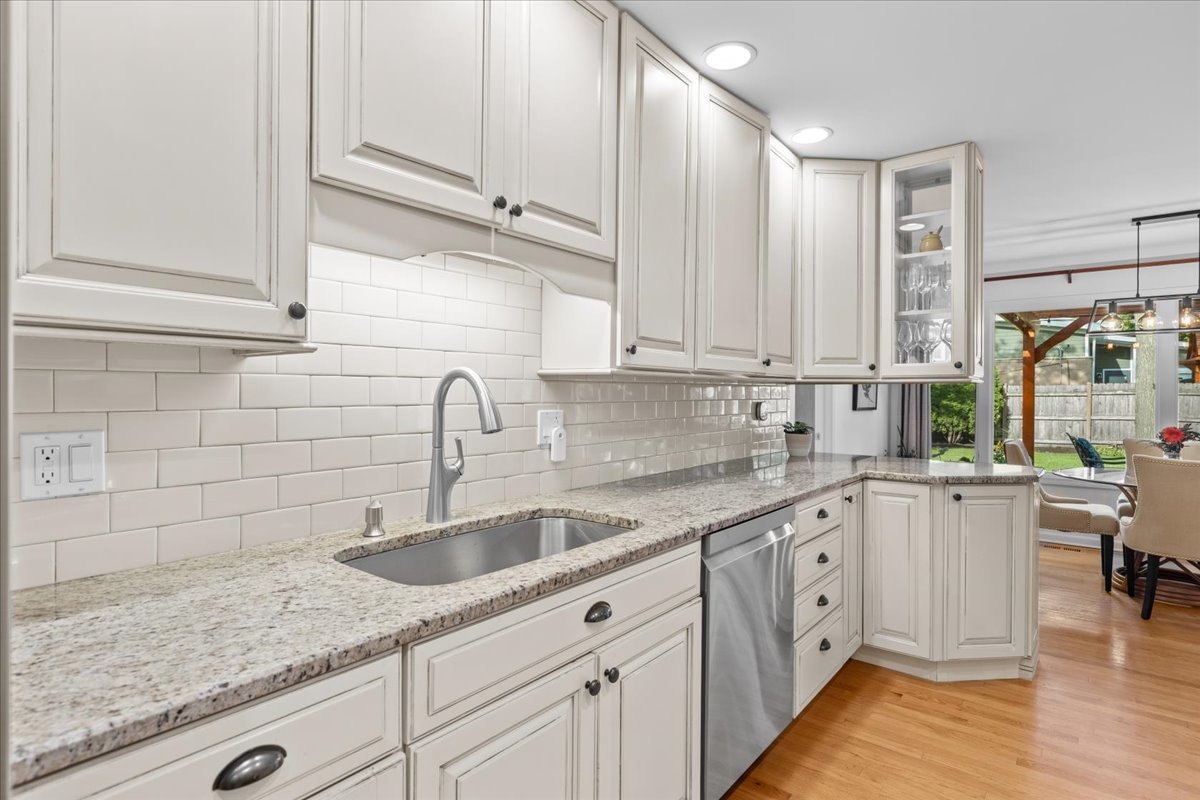 40 Williamsburg Road Evanston, IL 60203 - Photo 19 of 26 a kitchen with sink cabinets and window
