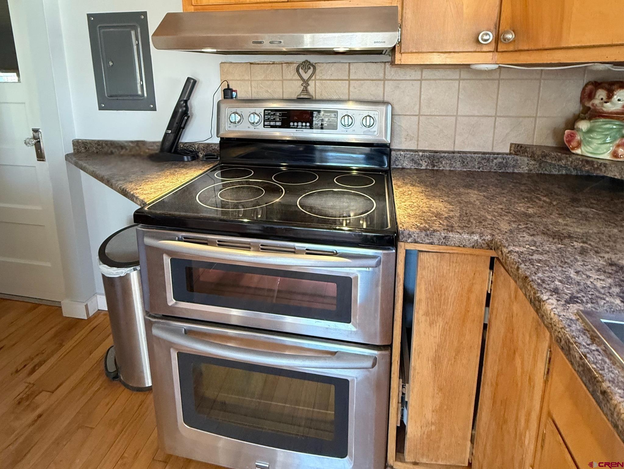 458 Price Road Paonia, CO 81428 - Photo 20 of 44 a stove top oven sitting inside of a kitchen