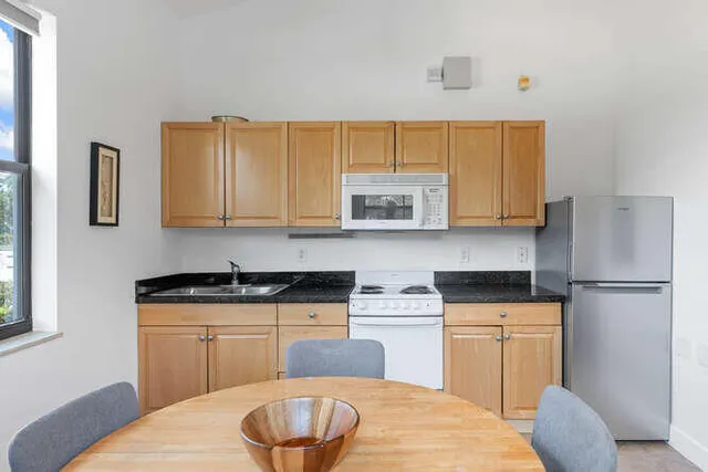 a bathroom with a sink toilet and vanity