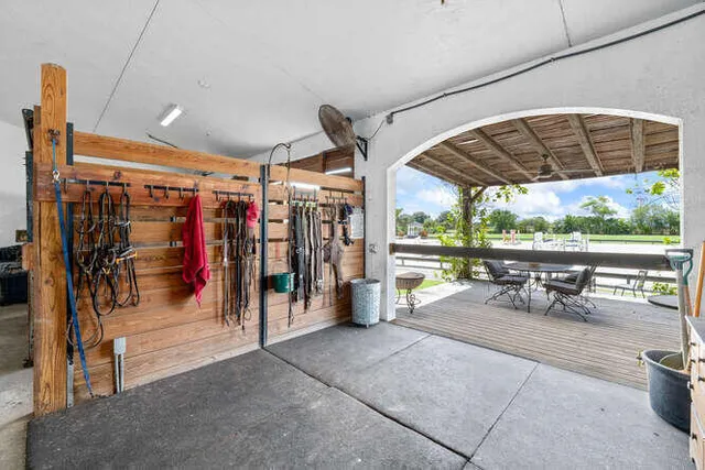 a view of a garage with a table and chairs