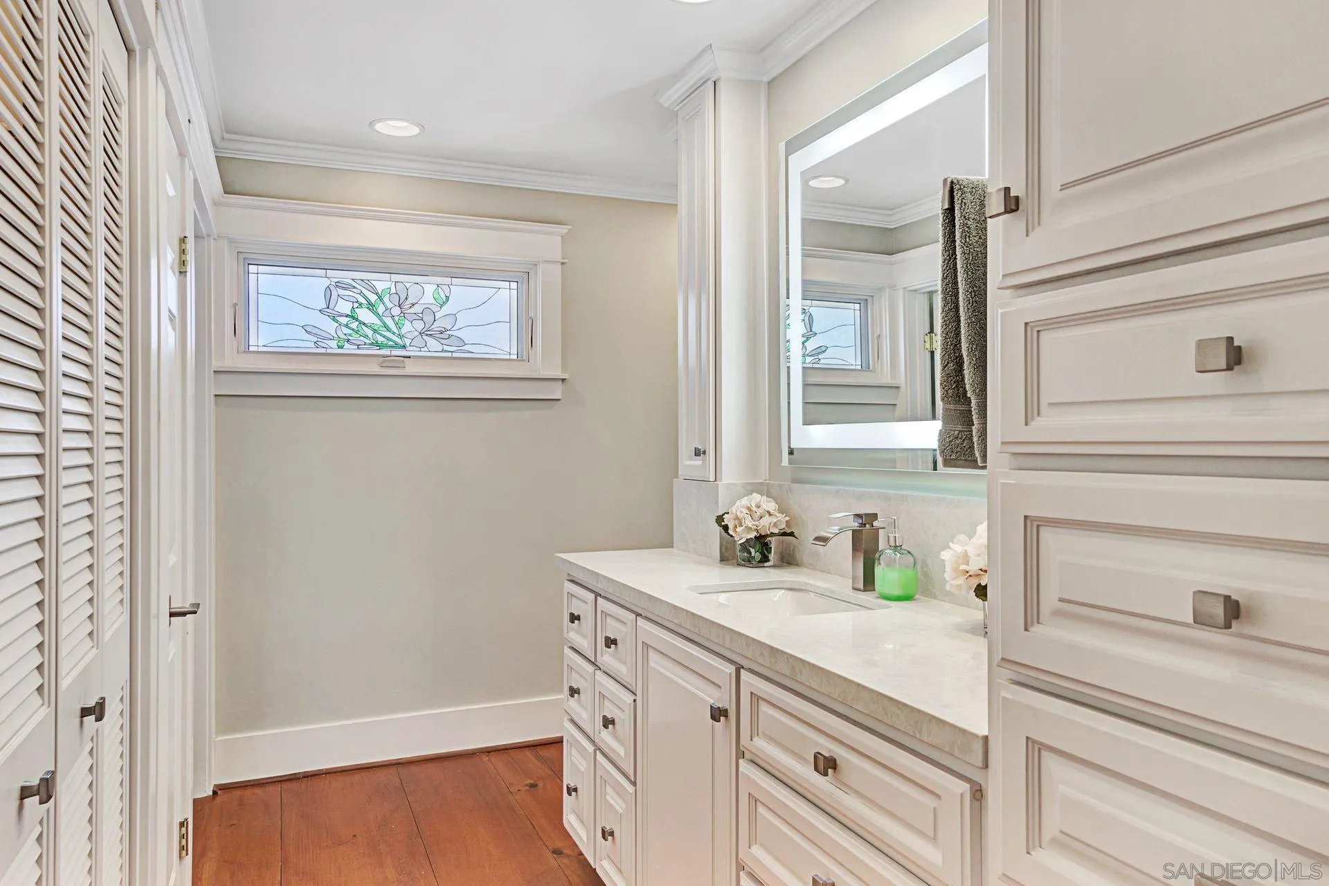 441 A Avenue Coronado, CA 92118 - Photo 16 of 27 a bathroom with a sink and a mirror