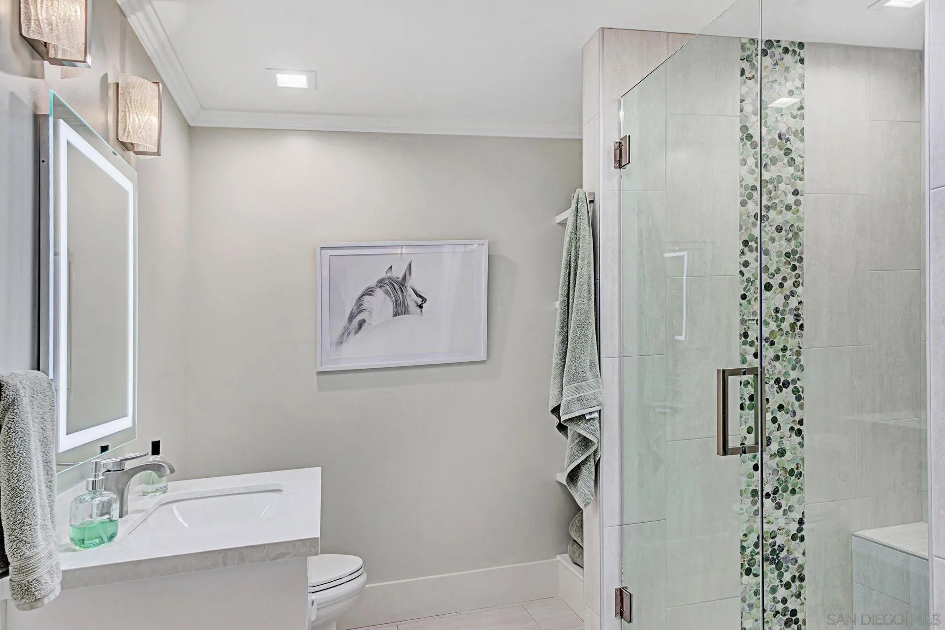 441 A Avenue Coronado, CA 92118 - Photo 17 of 27 a bathroom with a shower curtain and a sink