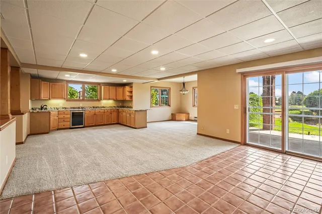 a kitchen with stainless steel appliances granite countertop a stove sink and cabinets