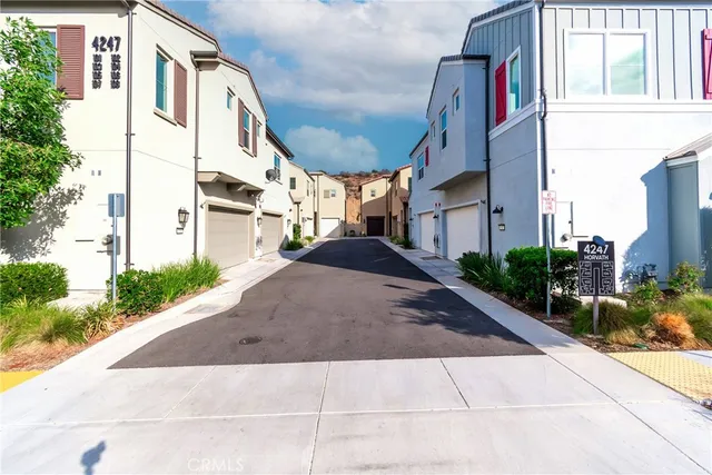 a view of a building with a street