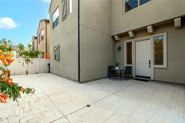 a back view of a house with a street