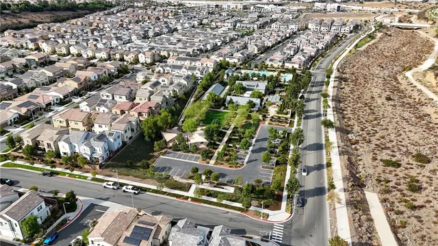 a view of a house with swimming pool and porch