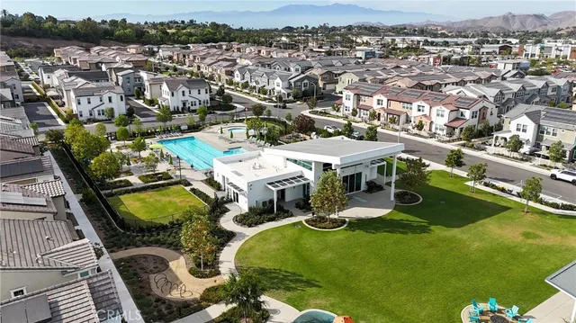 a view of a swimming pool with a lounge chairs