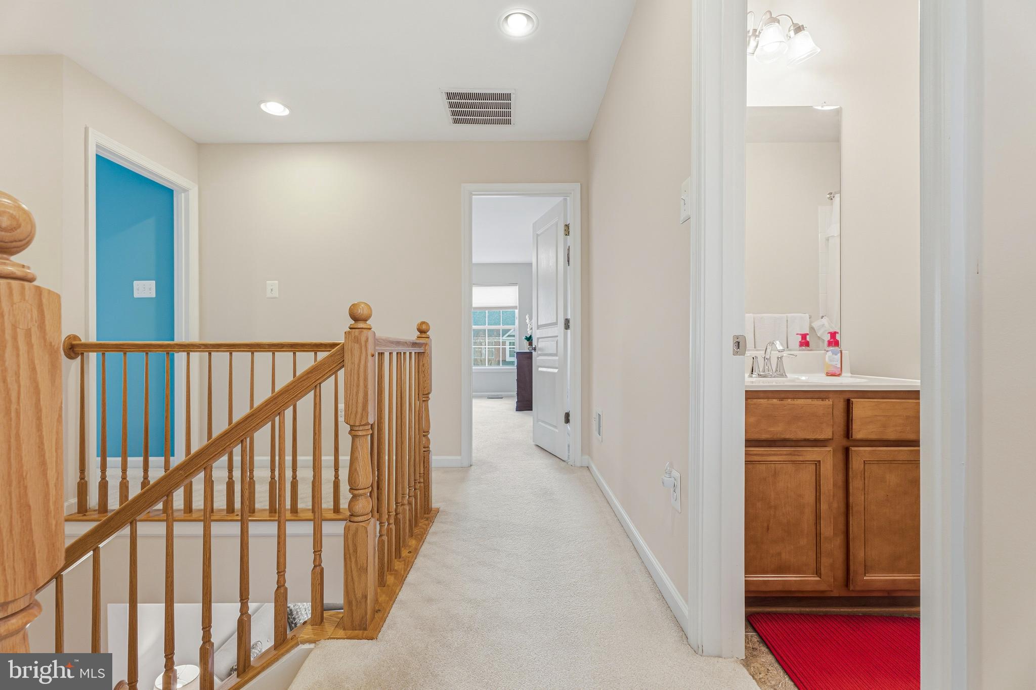 8876 Paddock Lane Baltimore, MD 21234 - Photo 14 of 37 a view of hallway with wooden floor