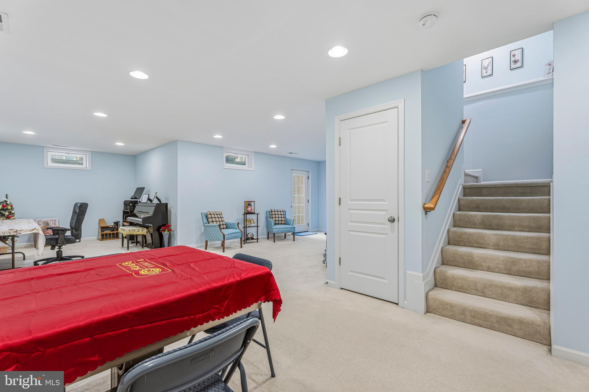 8876 Paddock Lane Baltimore, MD 21234 - Photo 29 of 37 a large kitchen with sink a refrigerator and a view of living room