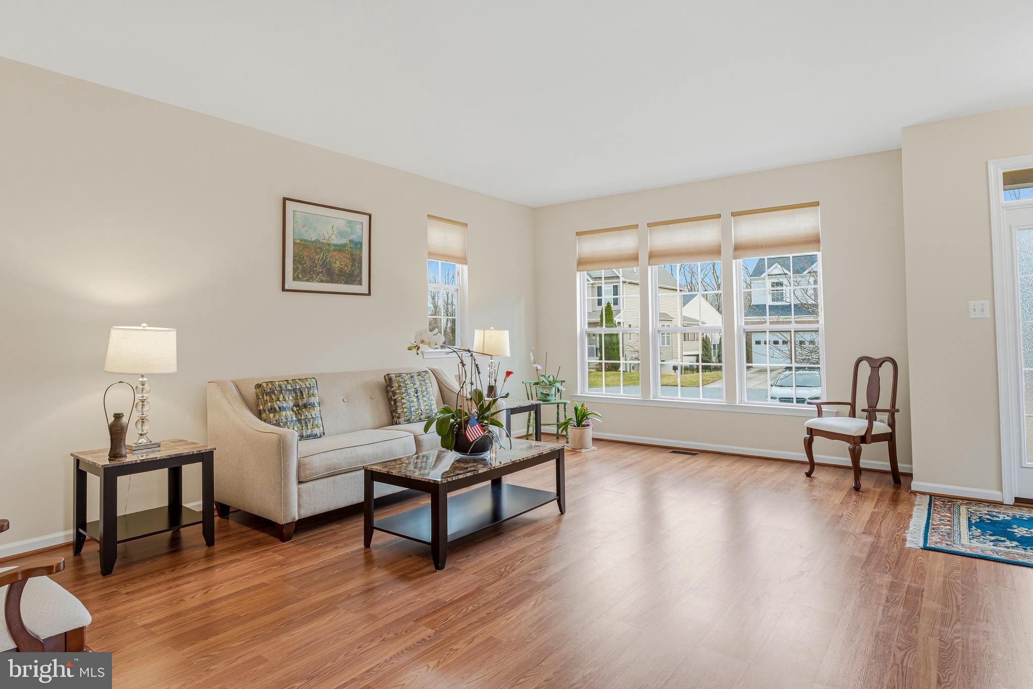 8876 Paddock Lane Baltimore, MD 21234 - Photo 3 of 37 a living room with furniture and a window