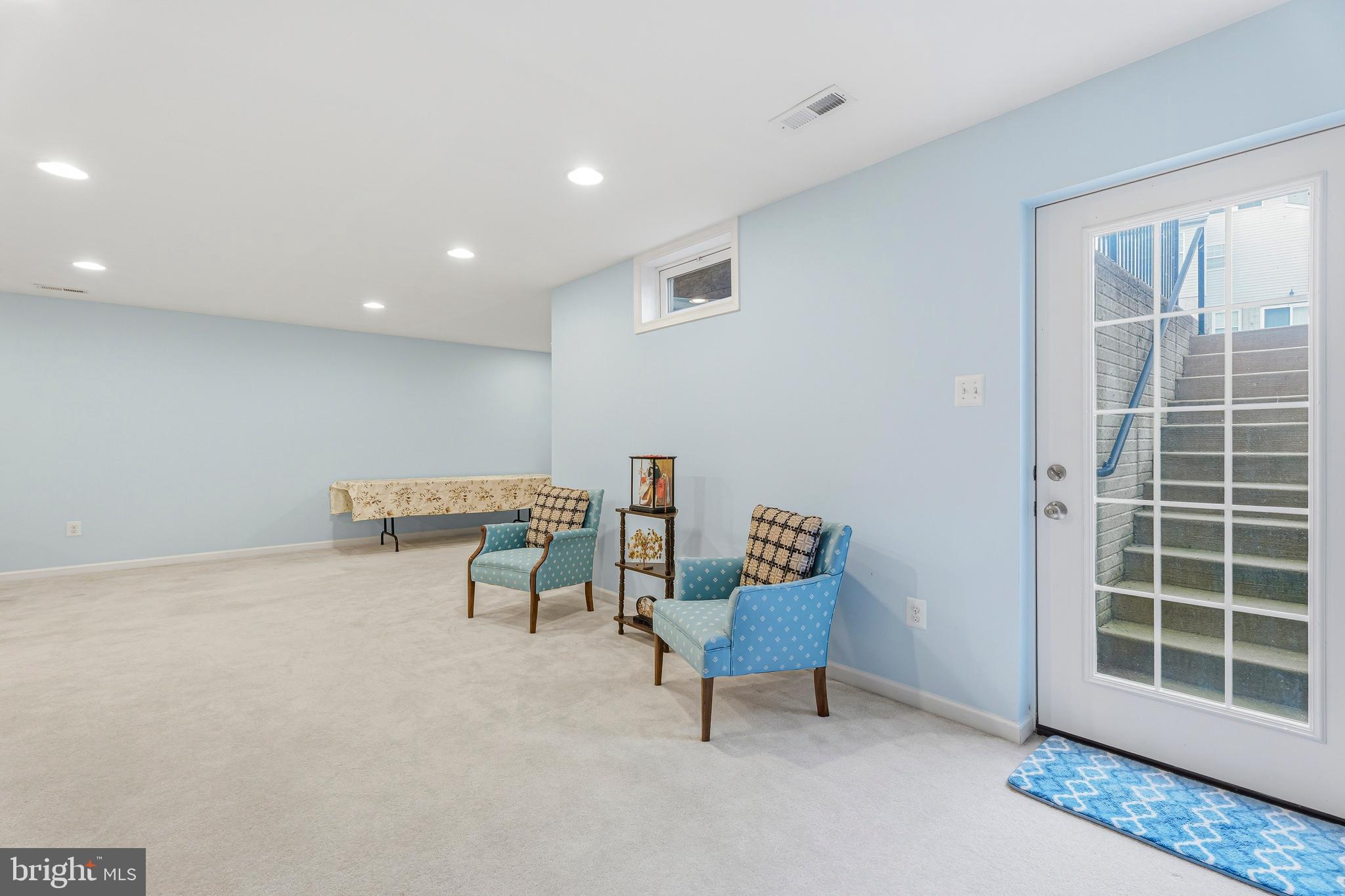 8876 Paddock Lane Baltimore, MD 21234 - Photo 33 of 37 a view of a livingroom with furniture and windows