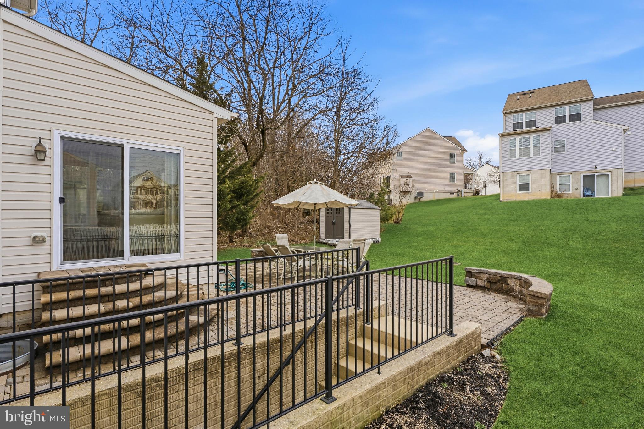 8876 Paddock Lane Baltimore, MD 21234 - Photo 36 of 37 a view of a house with a wooden deck