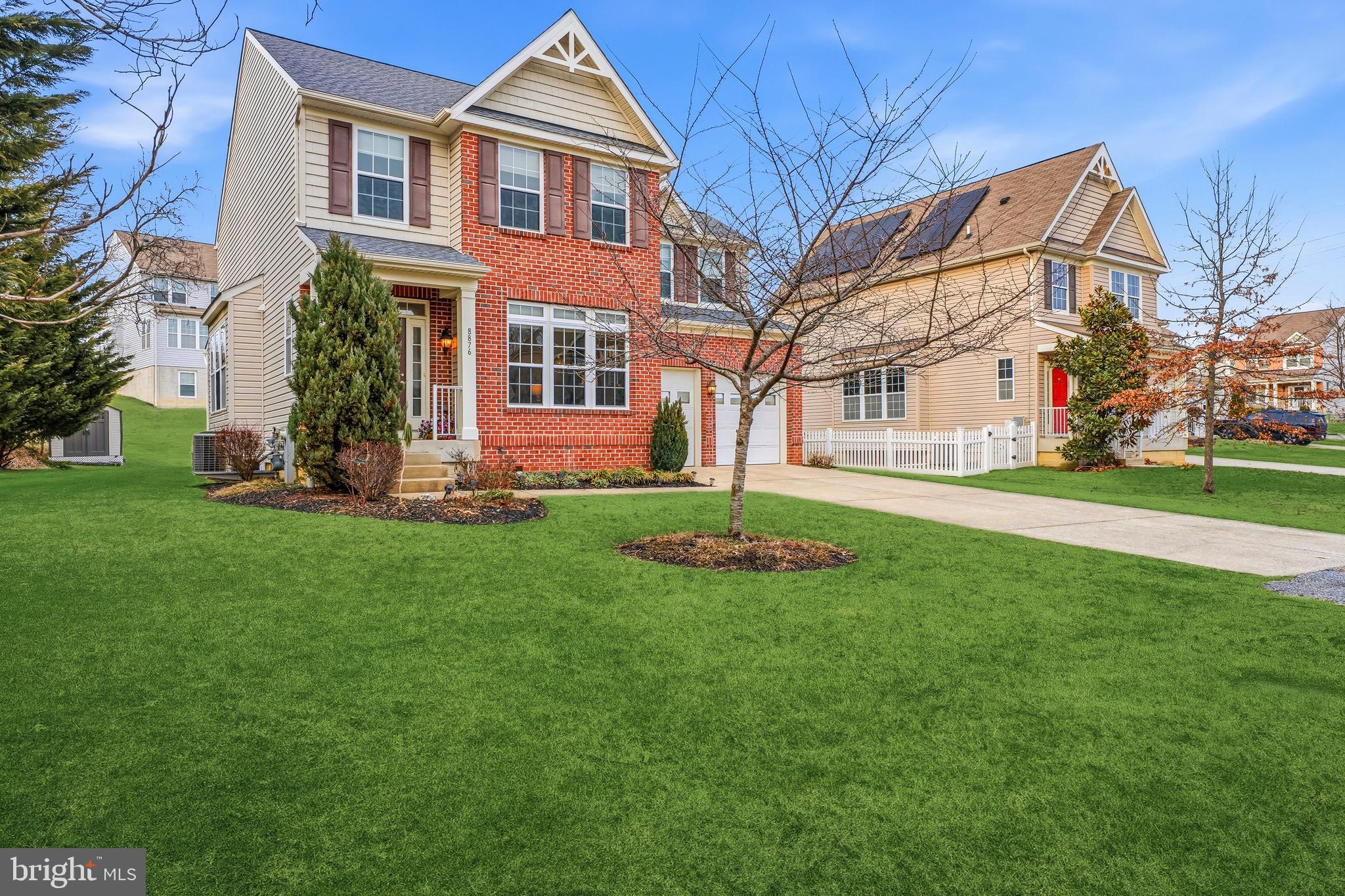 8876 Paddock Lane Baltimore, MD 21234 - Photo 37 of 37 a front view of a house with a yard