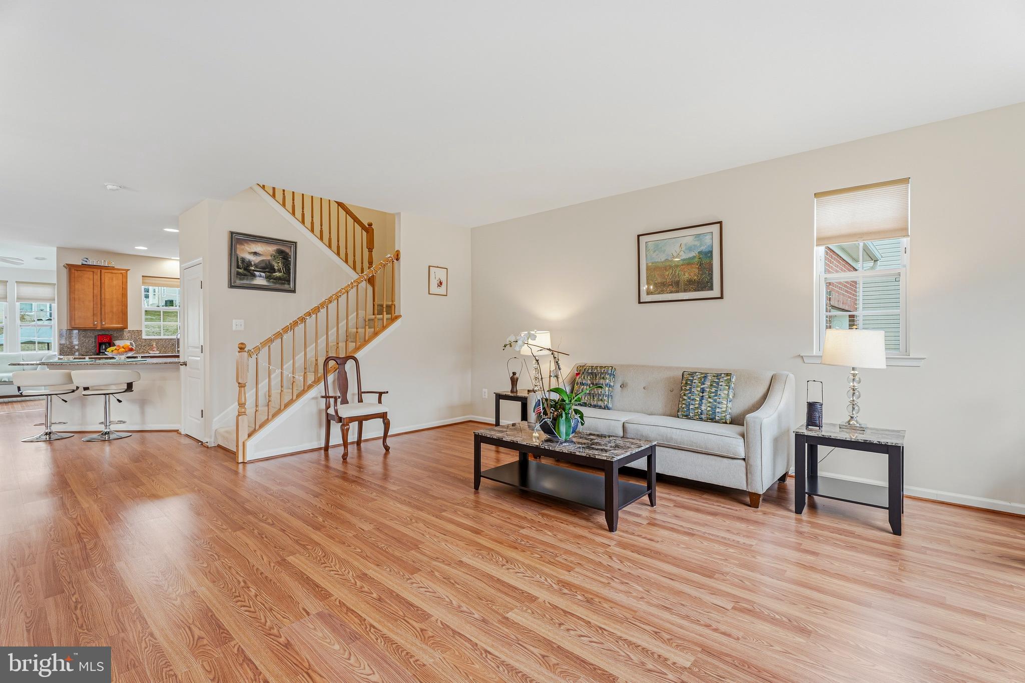 8876 Paddock Lane Baltimore, MD 21234 - Photo 4 of 37 a living room with furniture and a wooden floor